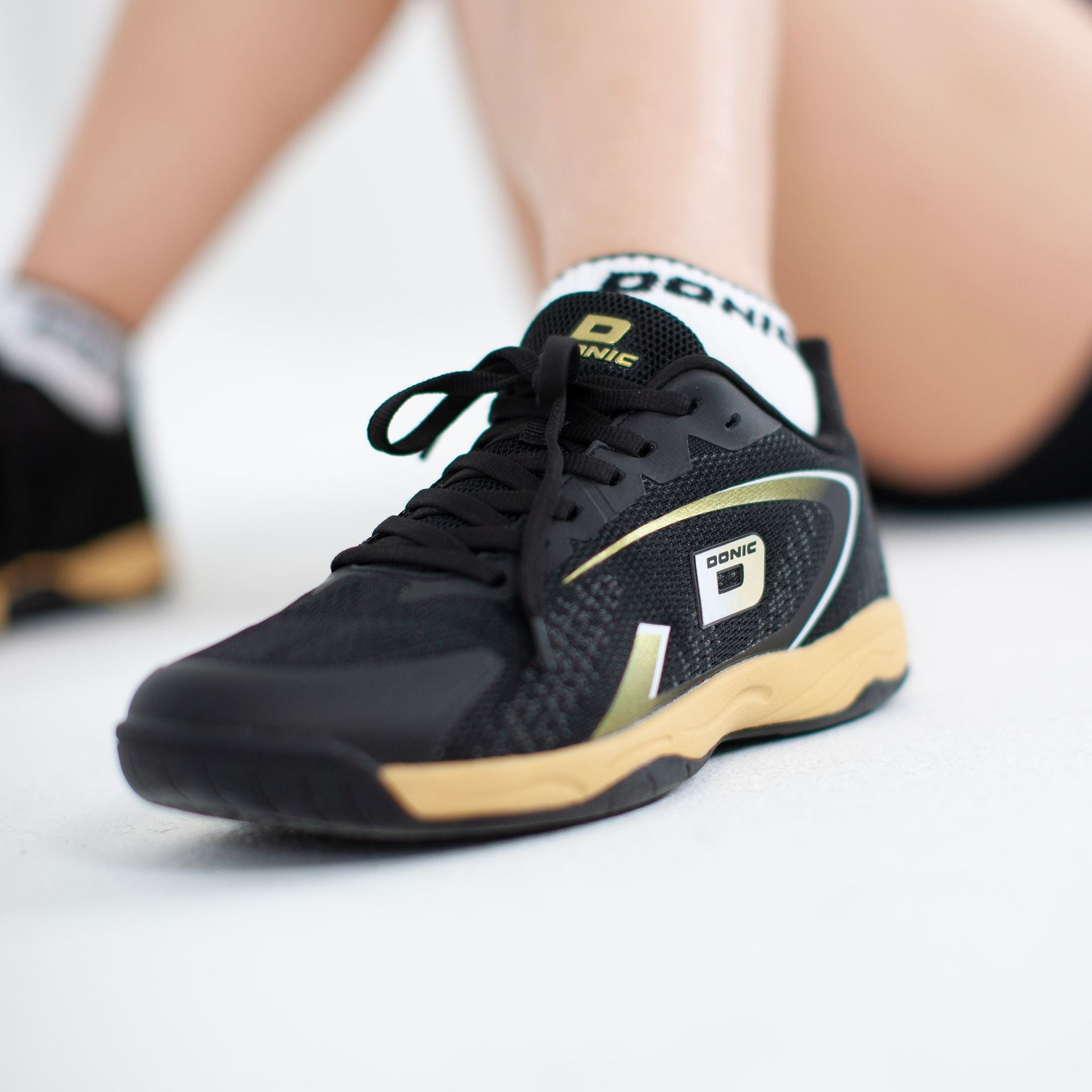 Donic Schuhe Competition Panther schwarz/gold/weiß